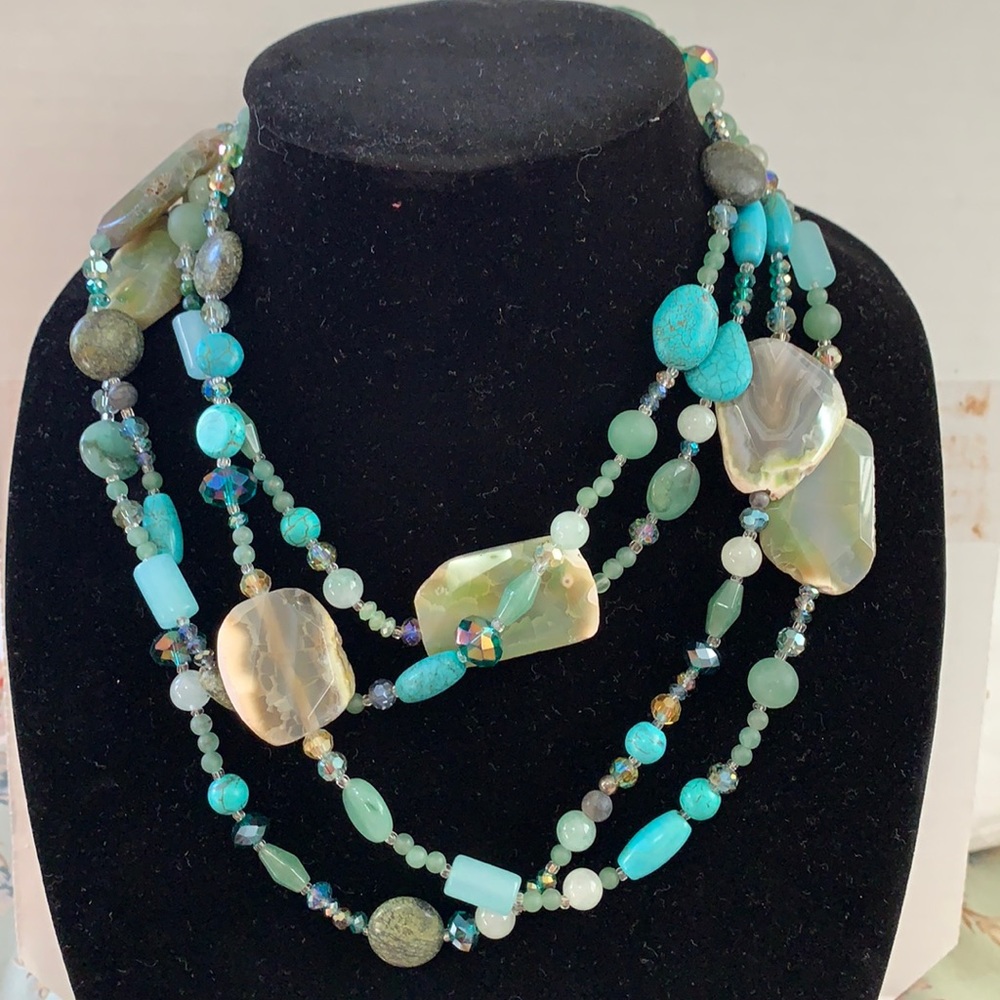 Two sets of long necklaces